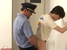 Older policeman busting fresh butt of a lawbreaker