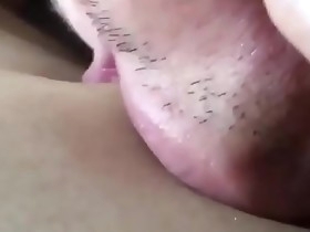 Sucking the guy'_s nipple